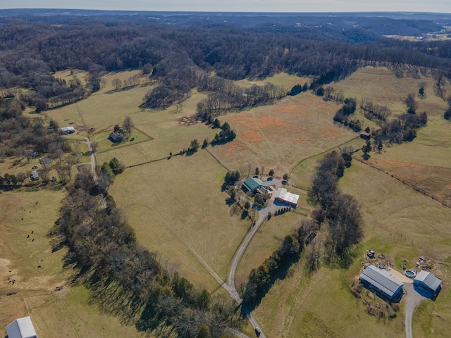 aerial view with a forest view and a rural view