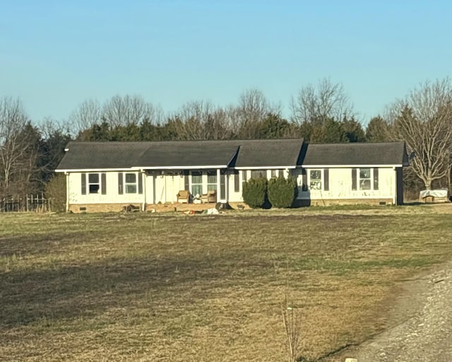 ranch-style house with crawl space and a front lawn