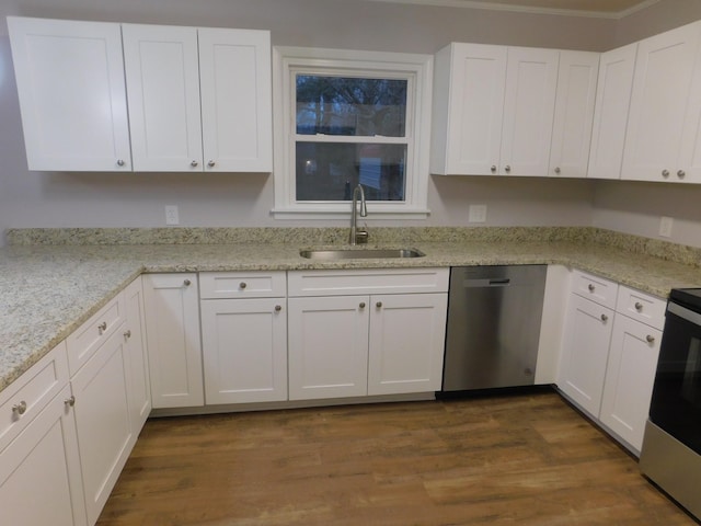 kitchen featuring dark wood-style floors, white cabinets, dishwasher, and a sink