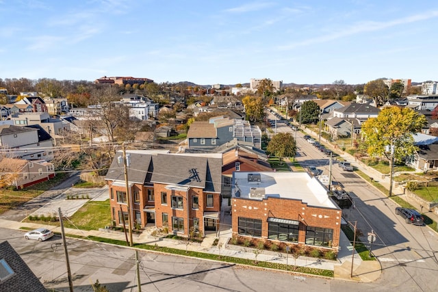 birds eye view of property with a residential view