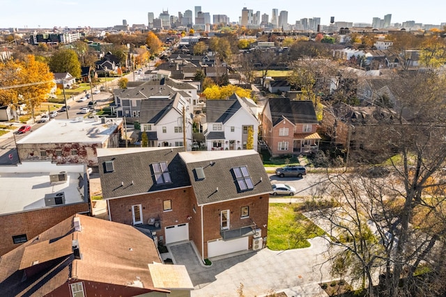 birds eye view of property with a city view