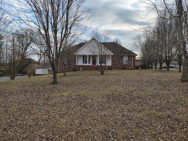 view of front of home with brick siding