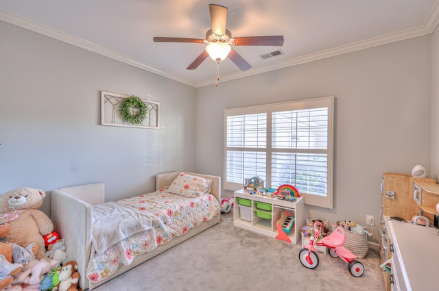 bedroom featuring ceiling fan, carpet floors, visible vents, and crown molding