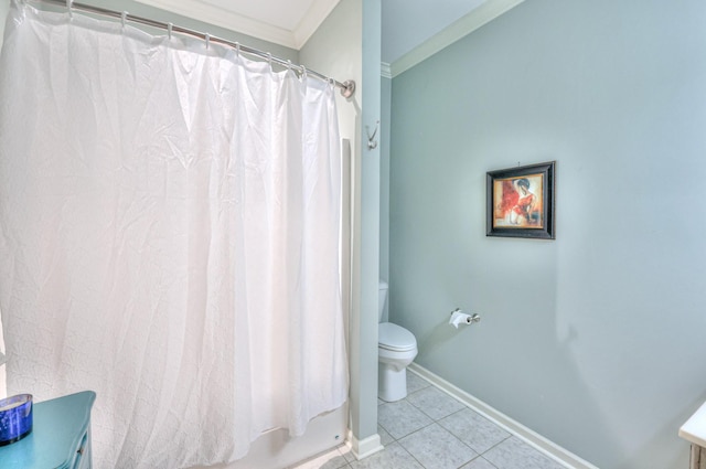 bathroom with ornamental molding, tile patterned flooring, baseboards, and toilet