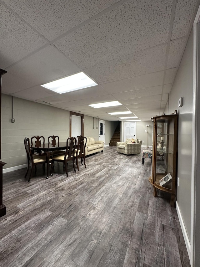 579 Old Celina Rd, Allons, TN 38541 - interior space featuring concrete block wall, stairs, baseboards, and wood finished floors