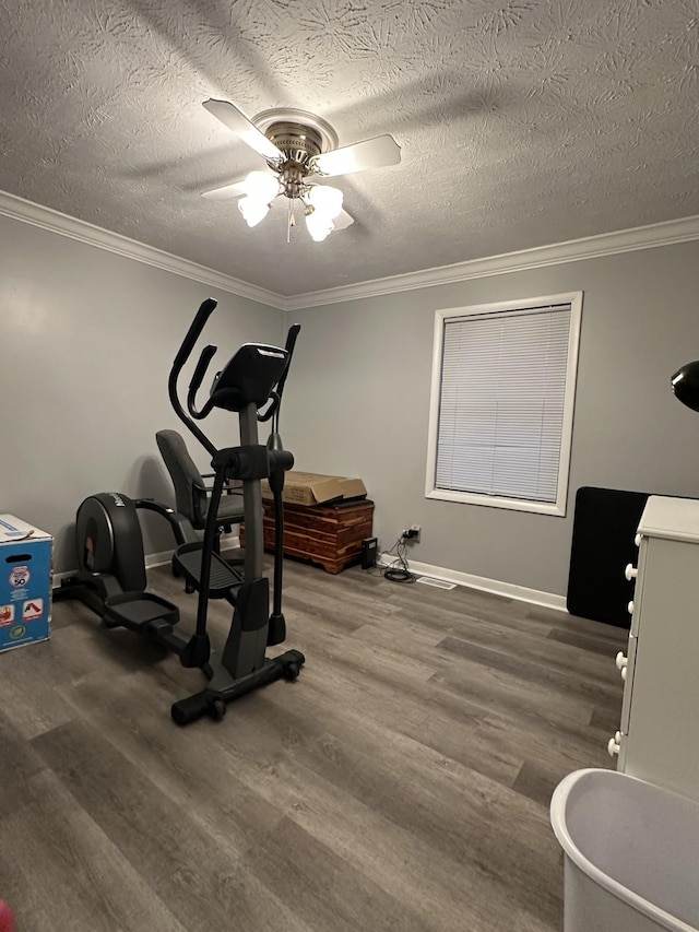 579 Old Celina Rd, Allons, TN 38541 - workout room featuring ceiling fan, crown molding, baseboards, and wood finished floors