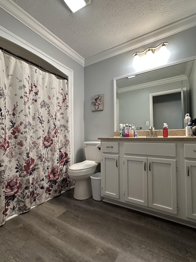 579 Old Celina Rd, Allons, TN 38541 - bathroom featuring crown molding, vanity, toilet, and wood finished floors