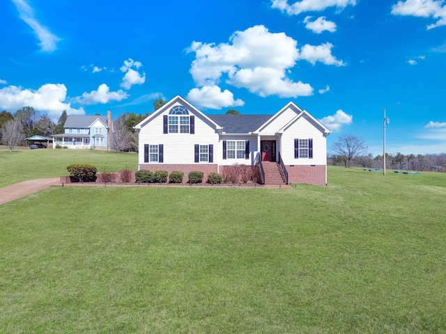 ranch-style house featuring a front lawn