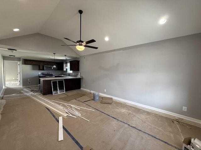 unfurnished living room with baseboards, lofted ceiling, ceiling fan, a sink, and recessed lighting