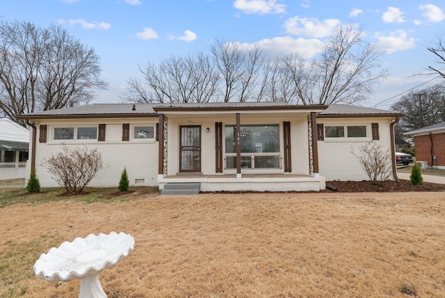 view of front of home featuring a porch, crawl space, a front yard, and brick siding