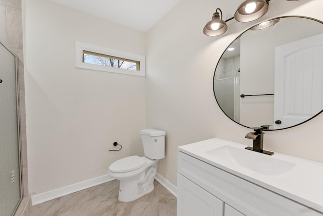 full bath featuring marble finish floor, a shower with door, toilet, vanity, and baseboards