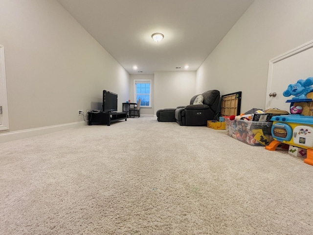 recreation room with recessed lighting, baseboards, and carpet floors