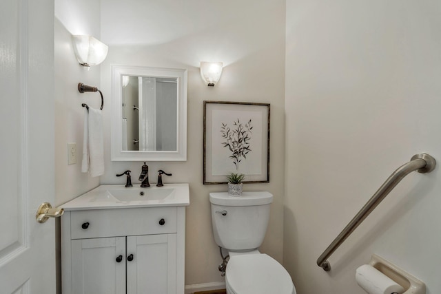 half bath with toilet and vanity