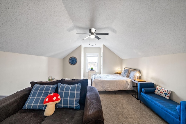 carpeted bedroom featuring lofted ceiling, ceiling fan, and a textured ceiling