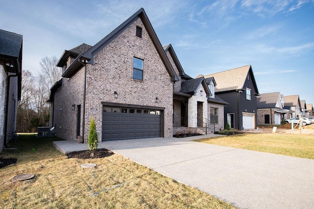 view of front of home with a garage, concrete driveway, brick siding, and cooling unit