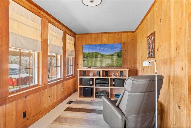 sitting room with wood walls