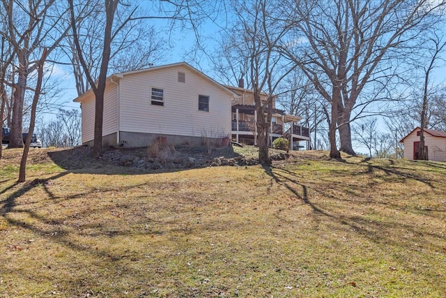 exterior space with a yard and a chimney