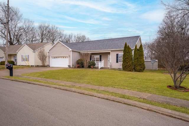 ranch-style home featuring a garage, covered porch, driveway, crawl space, and a front lawn