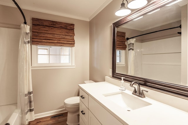 full bathroom with baseboards, visible vents, toilet, ornamental molding, and wood finished floors