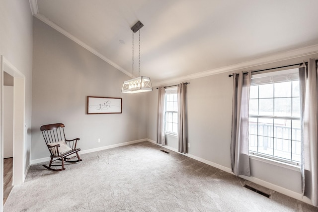 unfurnished room with lofted ceiling, ornamental molding, visible vents, and baseboards