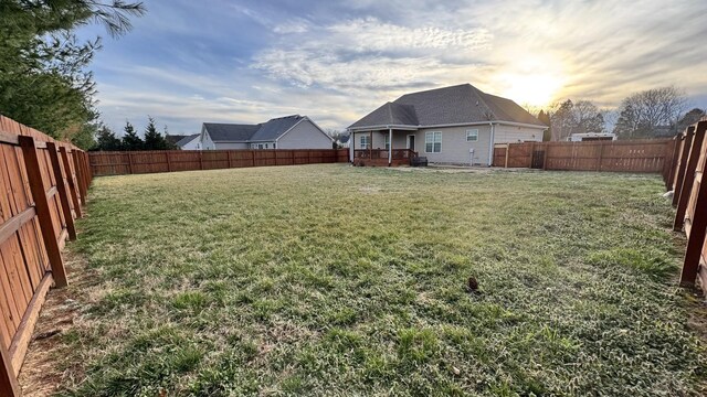 view of yard featuring a fenced backyard