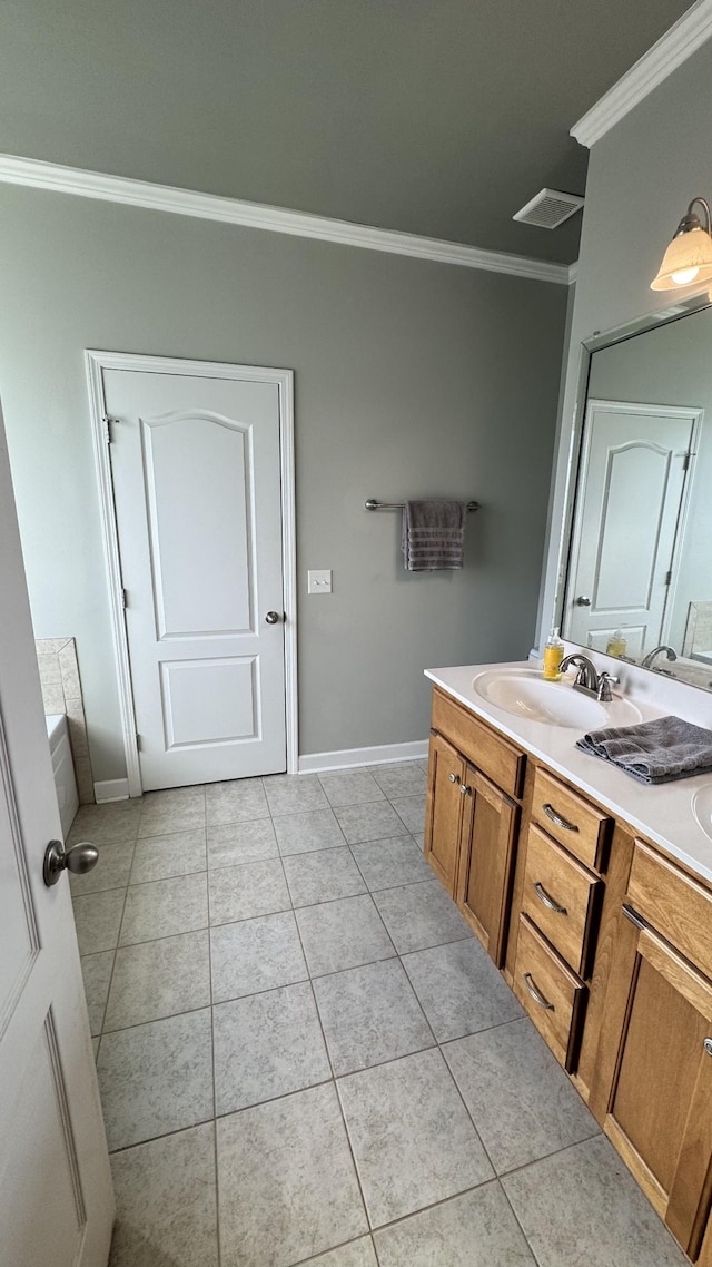 bathroom featuring double vanity, visible vents, ornamental molding, a sink, and tile patterned flooring