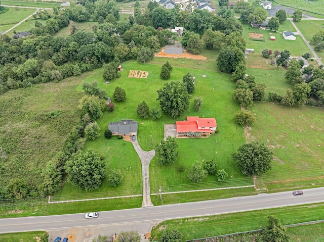 birds eye view of property featuring a rural view