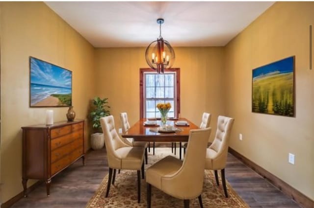 1319 Cemetery Rd, Auburn, KY 42206 - dining room featuring baseboards, dark wood finished floors, and a notable chandelier