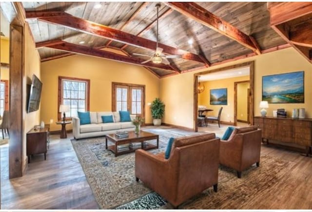 1319 Cemetery Rd, Auburn, KY 42206 - living room with lofted ceiling with beams, a ceiling fan, wood finished floors, wooden ceiling, and baseboards