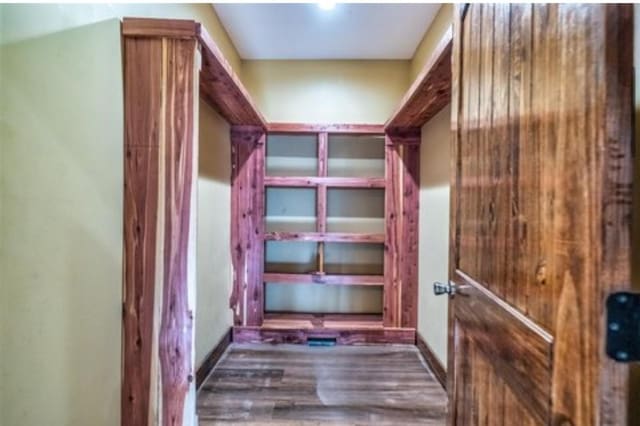 1319 Cemetery Rd, Auburn, KY 42206 - walk in closet featuring wood finished floors