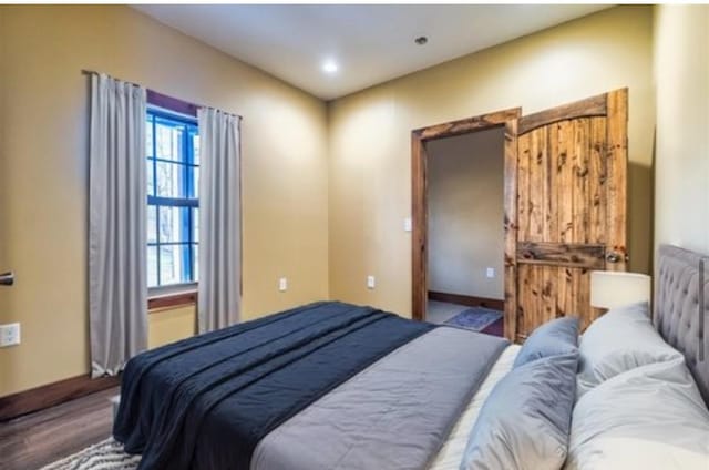 1319 Cemetery Rd, Auburn, KY 42206 - bedroom with baseboards and wood finished floors