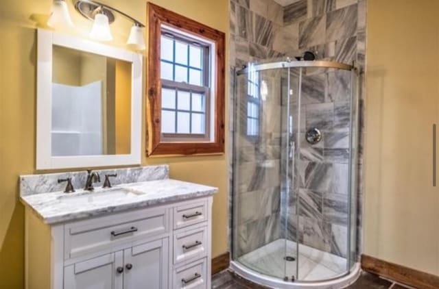 1319 Cemetery Rd, Auburn, KY 42206 - full bathroom featuring a shower stall, baseboards, and vanity