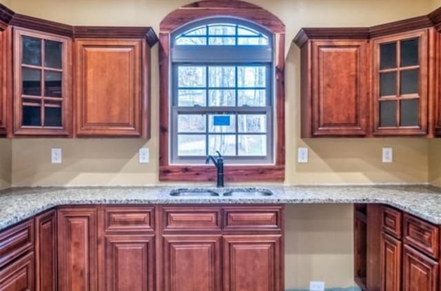 1319 Cemetery Rd, Auburn, KY 42206 - kitchen with glass insert cabinets, plenty of natural light, a sink, and built in study area