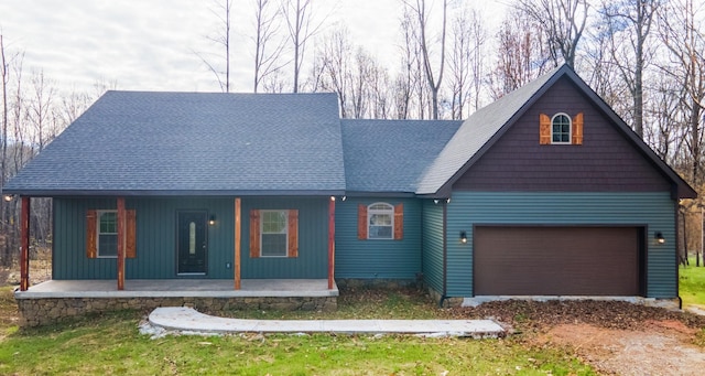 1319 Cemetery Rd, Auburn, KY 42206 - view of front facade featuring an attached garage, covered porch, and a shingled roof