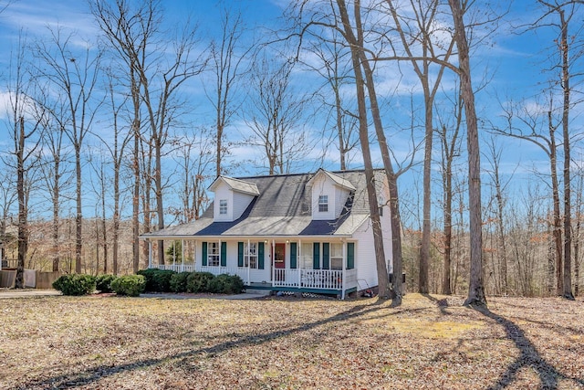 cape cod-style house with a porch