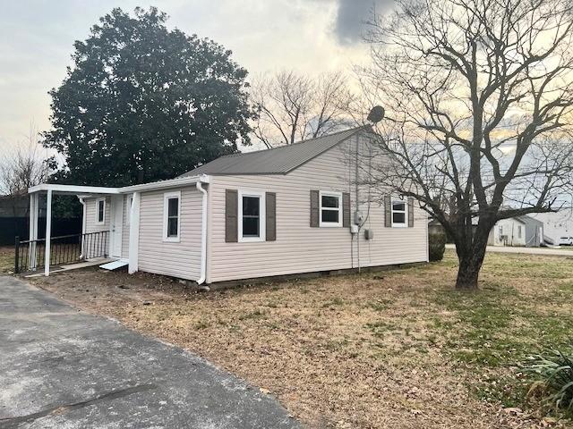 view of side of home with crawl space