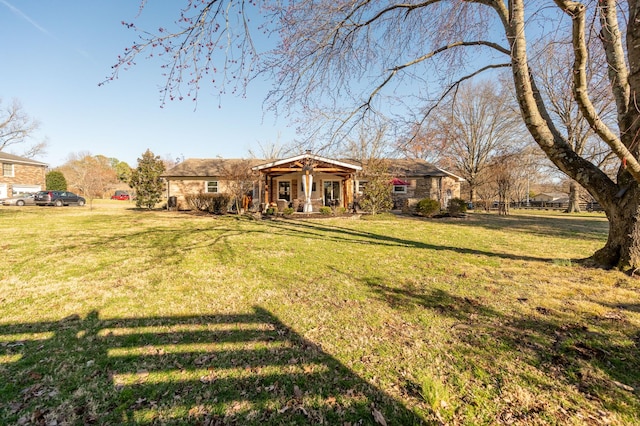 view of front facade with a front lawn