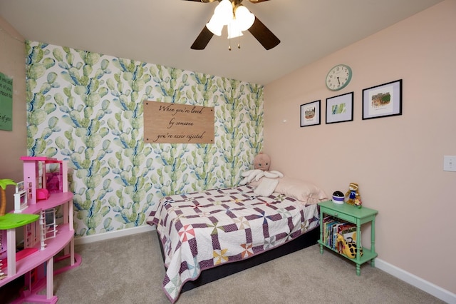 bedroom with carpet floors, wallpapered walls, baseboards, and a ceiling fan