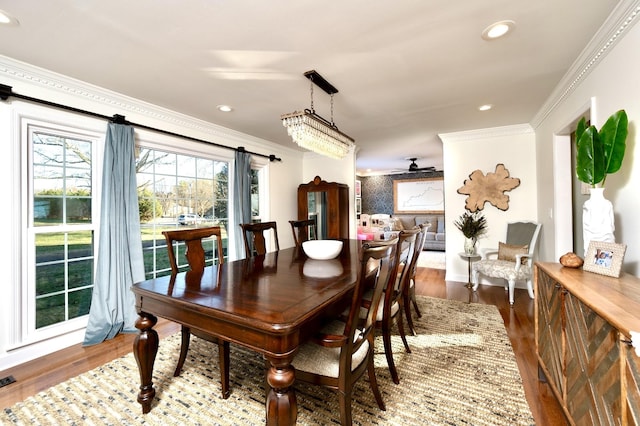 dining area with visible vents, ceiling fan, dark wood-type flooring, crown molding, and recessed lighting