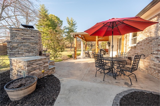 view of patio with outdoor dining space