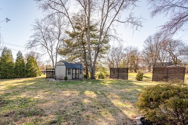 view of yard with a shed and an outdoor structure