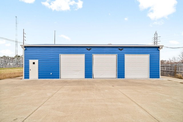 detached garage with fence