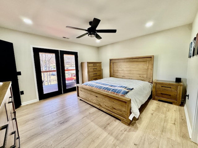 bedroom with access to exterior, visible vents, light wood-style floors, ceiling fan, and baseboards