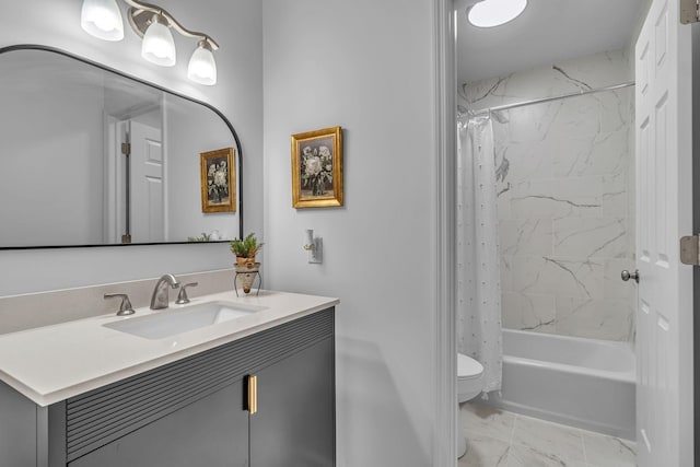 full bathroom with toilet, marble finish floor, shower / bath combo, and vanity