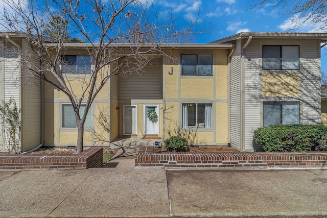 exterior space with stucco siding