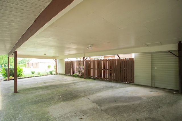 garage featuring fence