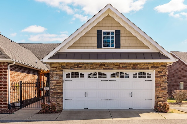 exterior space with driveway and fence