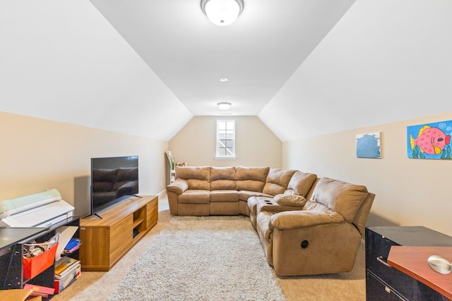 living room featuring carpet floors and vaulted ceiling