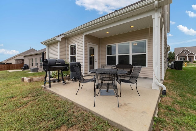 view of patio featuring a grill