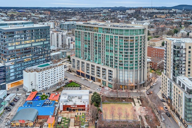 birds eye view of property with a view of city